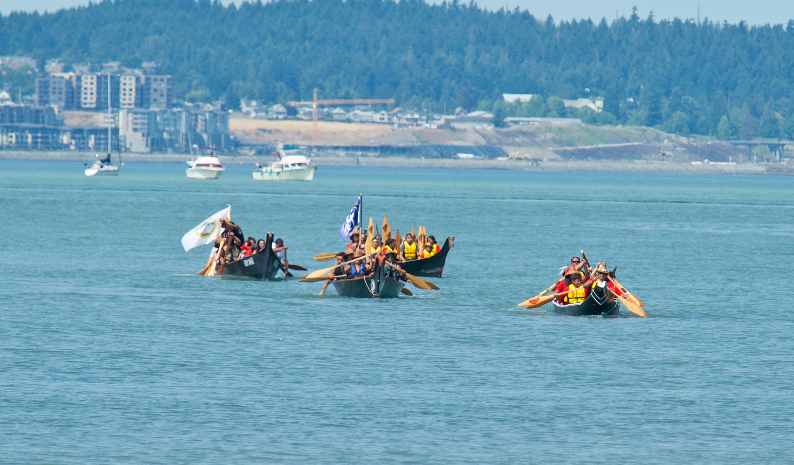 Power Paddle to Puyallup, the annual Native American traditional canoe gathering that takes place along the west coast of Washington and Canada, this year hosted by the Puyallup Tribe, Saturday, July 28, 2018. (Photo by John Froschauer/PLU)
