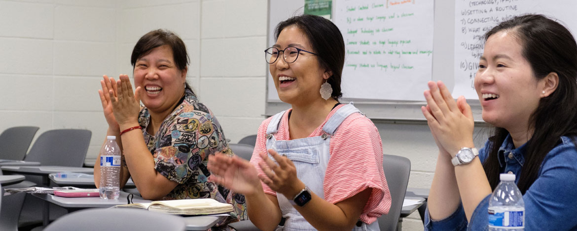 Native Korean and Chinese speakers learn how to teach lessons in their respective languages through the STARTALK program, a grant-funded program that came to PLU's campus this year for the first time in the 11-year partnership with Seattle Public Schools. (Photos by John Froschauer/PLU)