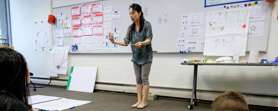 Native Korean and Chinese speakers learn how to teach lessons in their respective languages through the STARTALK program, a grant-funded program that came to PLU's campus this year for the first time in the 11-year partnership with Seattle Public Schools. (Photos by John Froschauer/PLU)