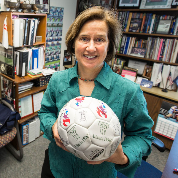 Colleen Hacker holding a soccer ball