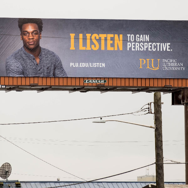 PLU "LISTEN" campaign billboard in Tacoma, WA