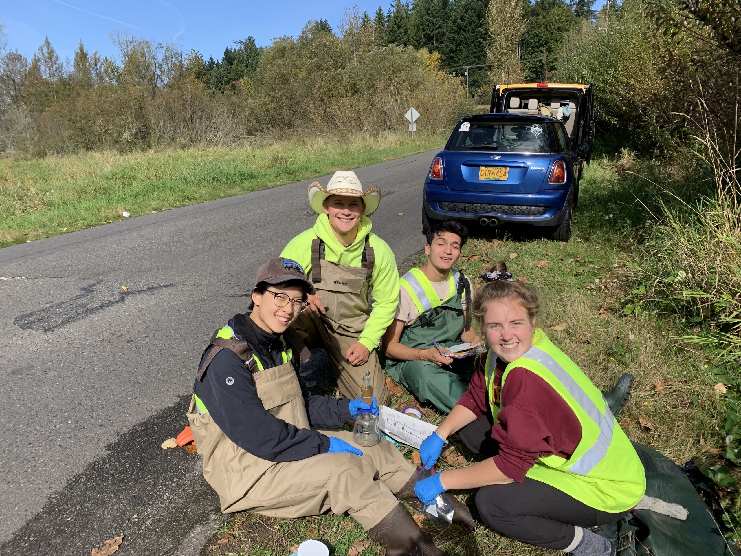 Photos of PLU students collecting samples near a stream bed.