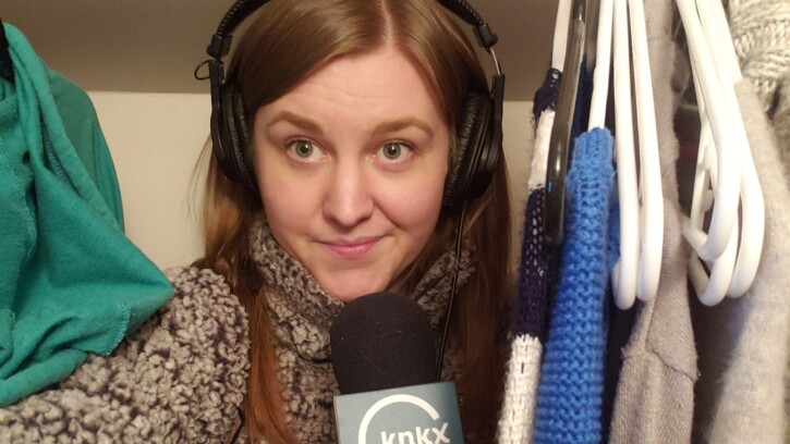 Kari Plog ‘11, a digital journalist for local NPR affiliate radio station KNKX, has been telling the stories of Western Washington residents trying to deal with the fallout of a global health crisis while navigating the challenges that come with that — like turning her closet into a makeshift recording studio for audio.