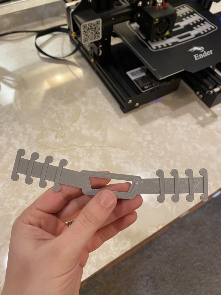 This simple plastic device, made by Jessica and Travis Pagel, alleviates rubbing behind the ears for people who must wear face masks for long hours. This simple plastic device, made by Jessica and Travis Pagel, alleviates rubbing behind the ears for people who must wear face masks for long hours.