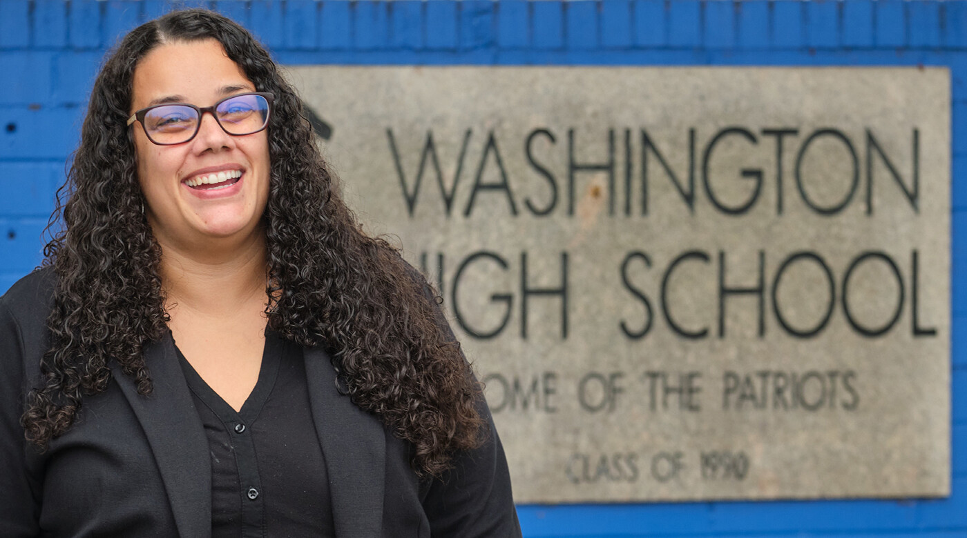 Brooke Brown in front of Washington High School Sign