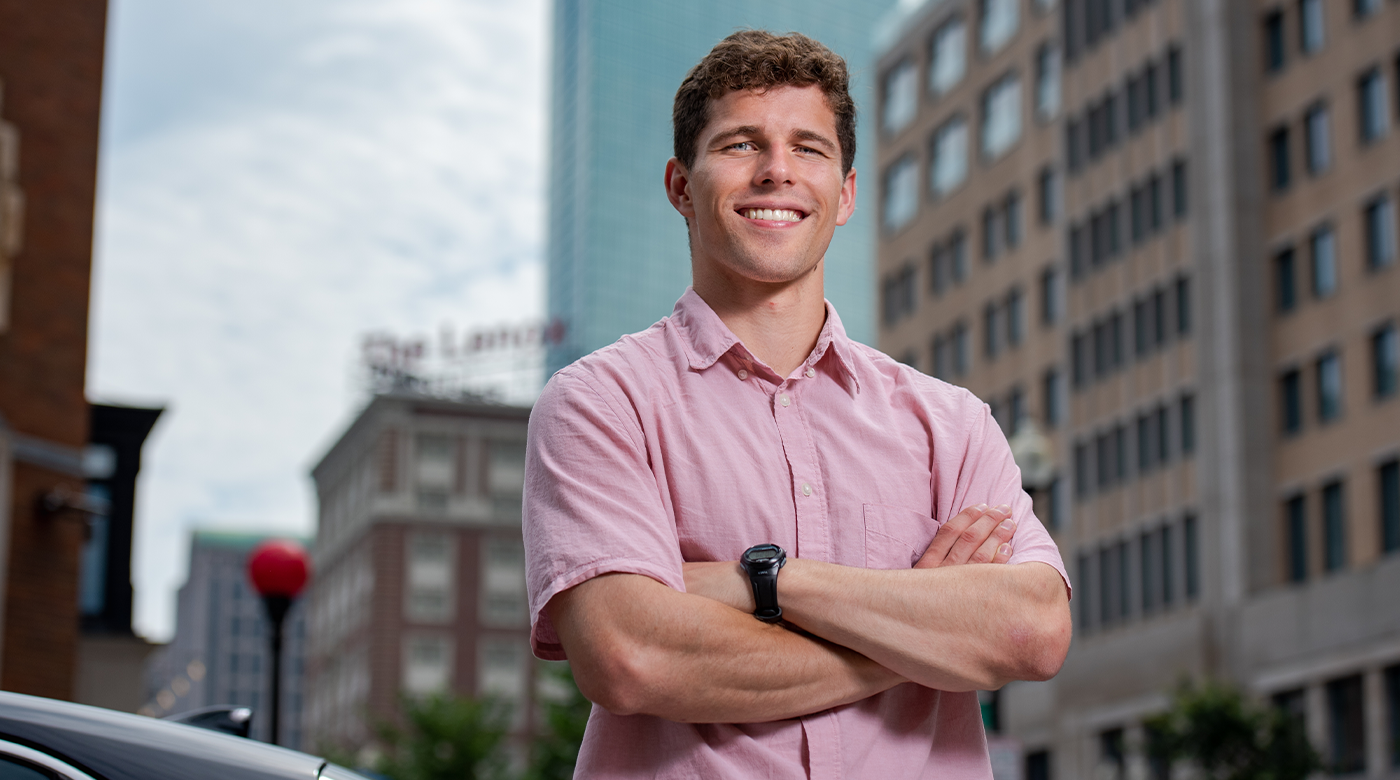 Keegan Dolan in Downtown Boston outside the headquarters of the Analysis Group (photo by Derek Palmer)