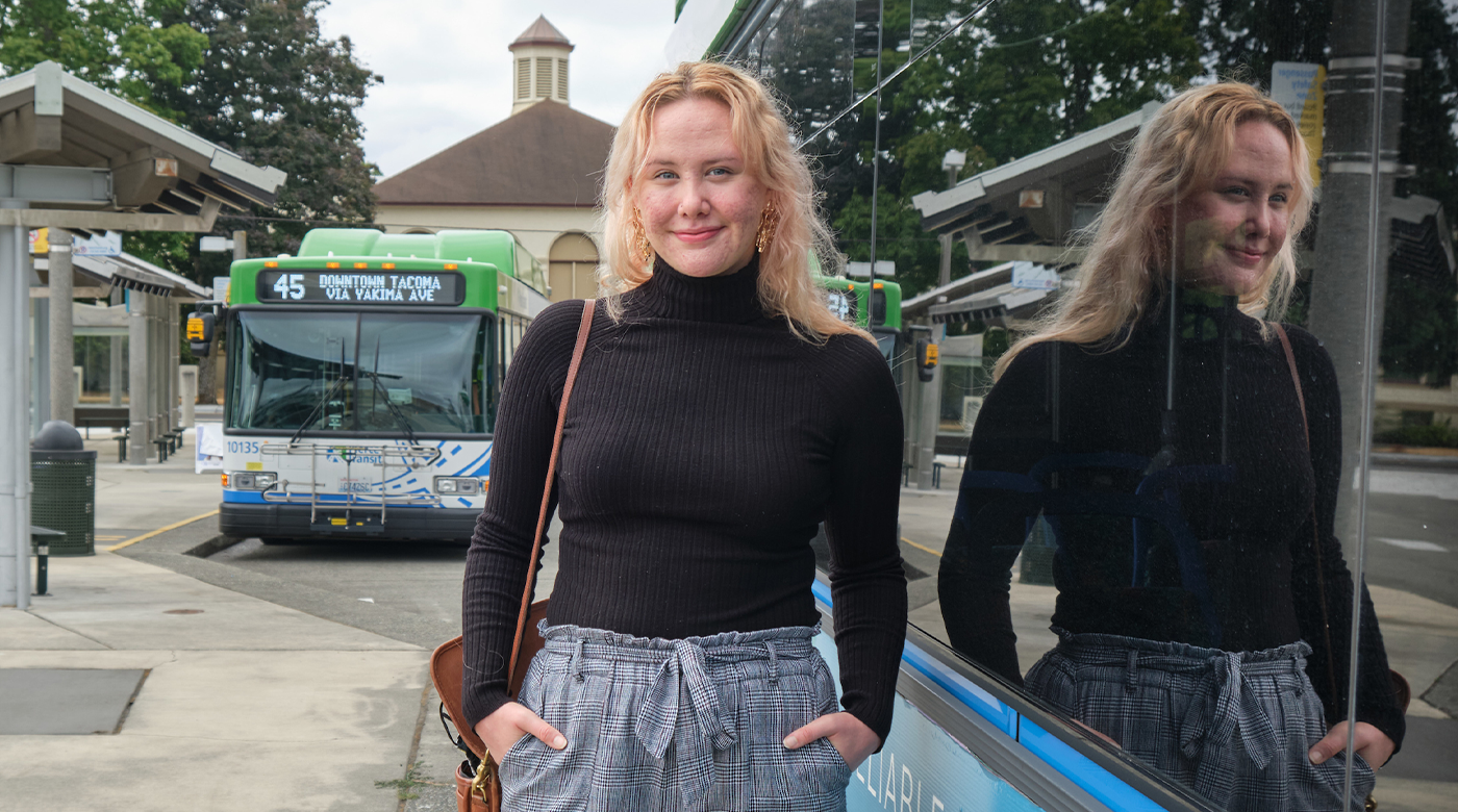 Kenzie Knapp '23, incoming ASPLU Environmental Justice Director at the Pierce Co Transit center near campus, Friday, Aug. 27, 2021, at PLU. One of her goals is encouraging public transit use. (Photo/John Froschauer)