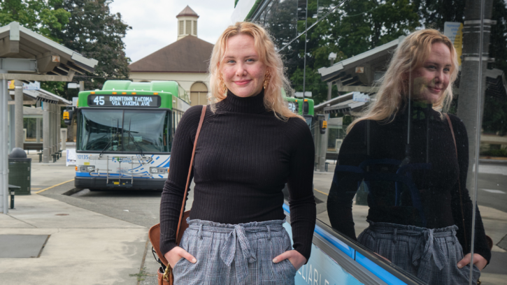 Kenzie Knapp '23, incoming ASPLU Environmental Justice Director at the Pierce Co Transit center near campus, Friday, Aug. 27, 2021, at PLU. One of her goals is encouraging public transit use. (Photo/John Froschauer)
