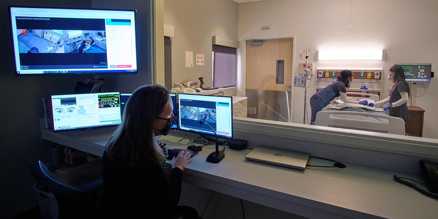Nursing students in the simulation lab viewed through a one way window from the control room, Thursday, Oct. 22, 2020, at PLU. (PLU Photo/John Froschauer) Nursing students in the simulation lab viewed through a one way window from the control room, Thursday, Oct. 22, 2020, at PLU. (PLU Photo/John Froschauer)