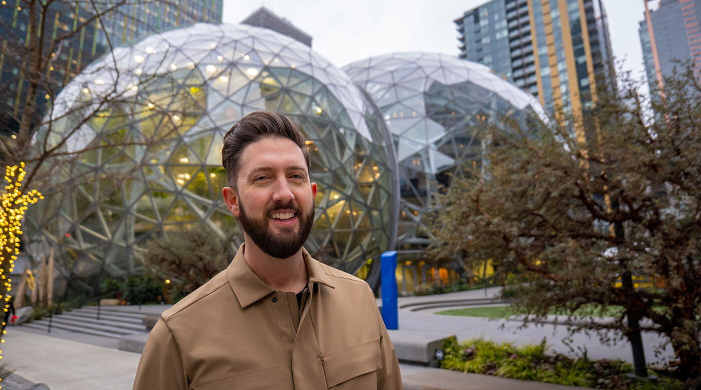 Regan Zeebuyth stands in front of the Amazon Spheres in downtown Seattle
