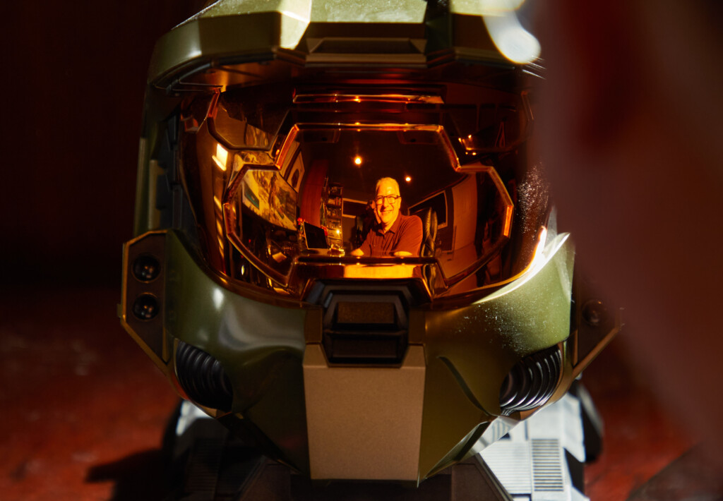 Grande sees his reflection through a model Halo helmit. He worked on the iconix Xbox game during his tenure at Microsoft's gaming studio