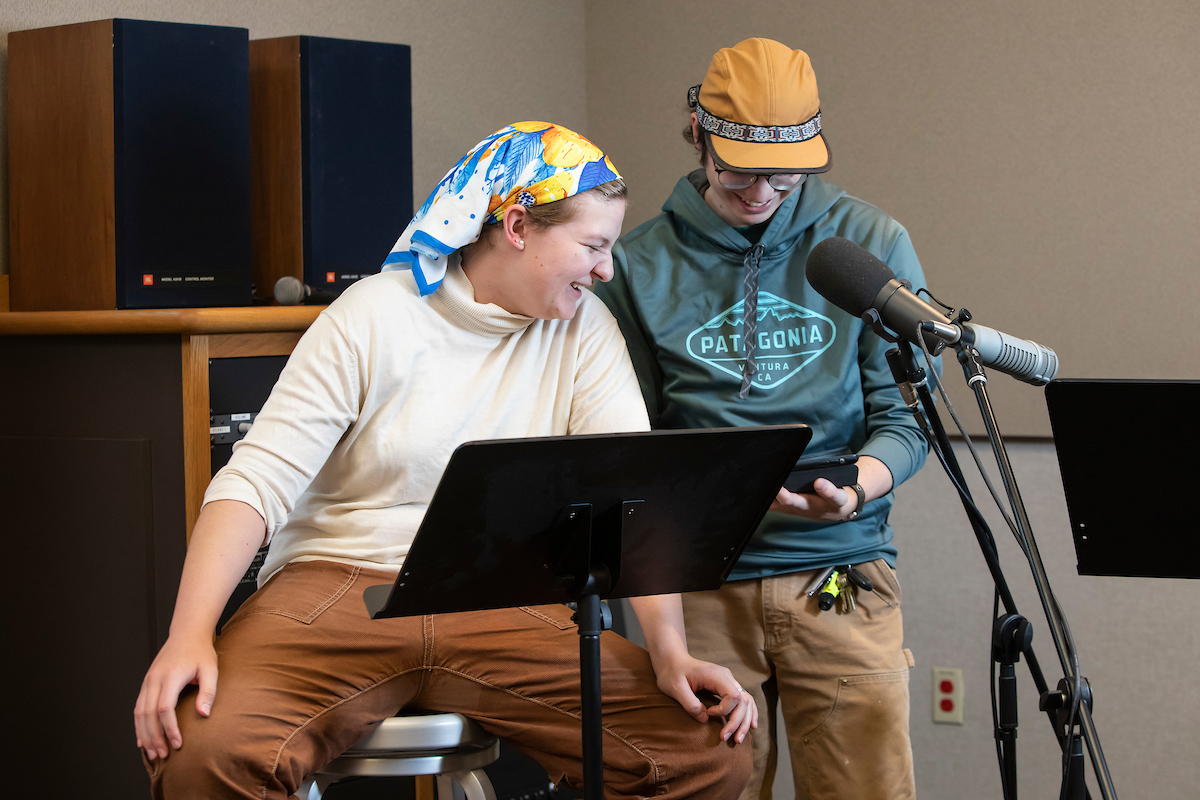 Z Rich ’24, left, and Fulton Bryant-Anderson ’23, produce the radio show “War of the Worlds,” in the Student Media Center in the Neeb building, Tuesday, Oct. 25, 2022, at PLU. (PLU Photo / Sy Bean)