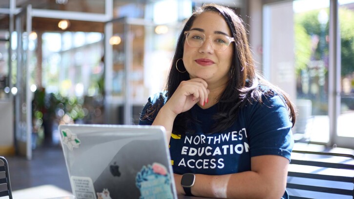 Angela Pierce-Ngo ’12, a director with Northwest Education Access, photographed in a Pierce Country Library, a typical spot to meet clients along with coffee shops, Monday, Aug. 15, 2022, in University Place. (Photo/John Froschauer)