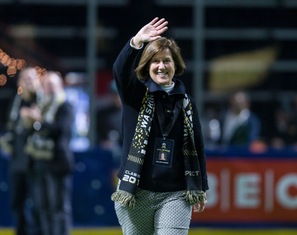 hacker-tac-stars-2-24-19-2441 Colleen Hacker waves to the crowd while being honored on the field at a Tacoma Stars soccer game.
