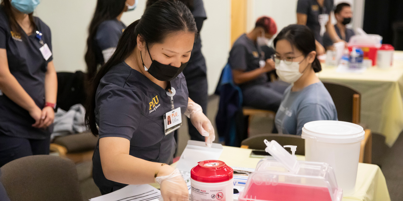 PLU MSN students running their annual flu shot clinic in fall 2022.