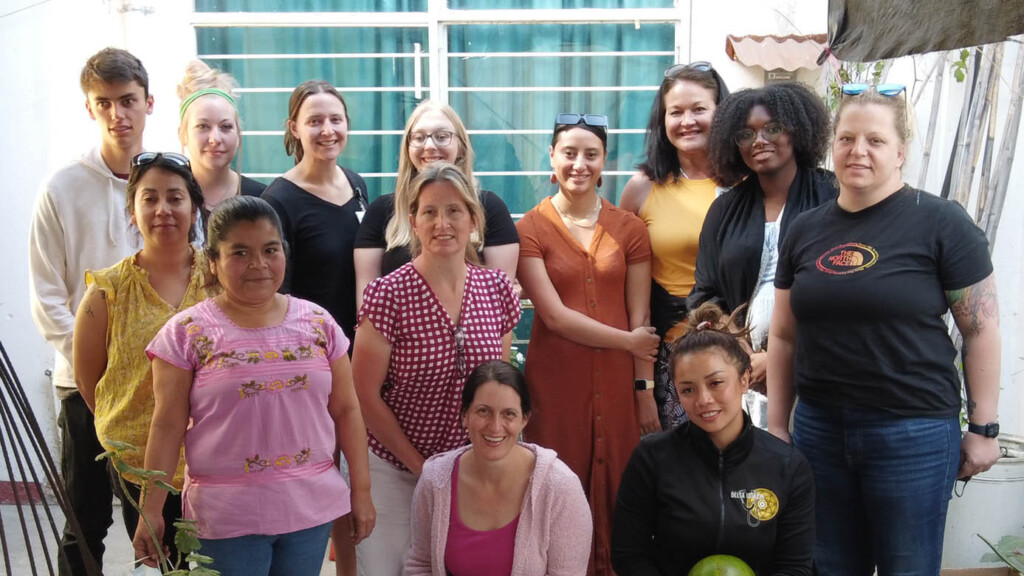 Surla-away-1 PLU nursing students pose for a group photo at a health care facility in Mexico.