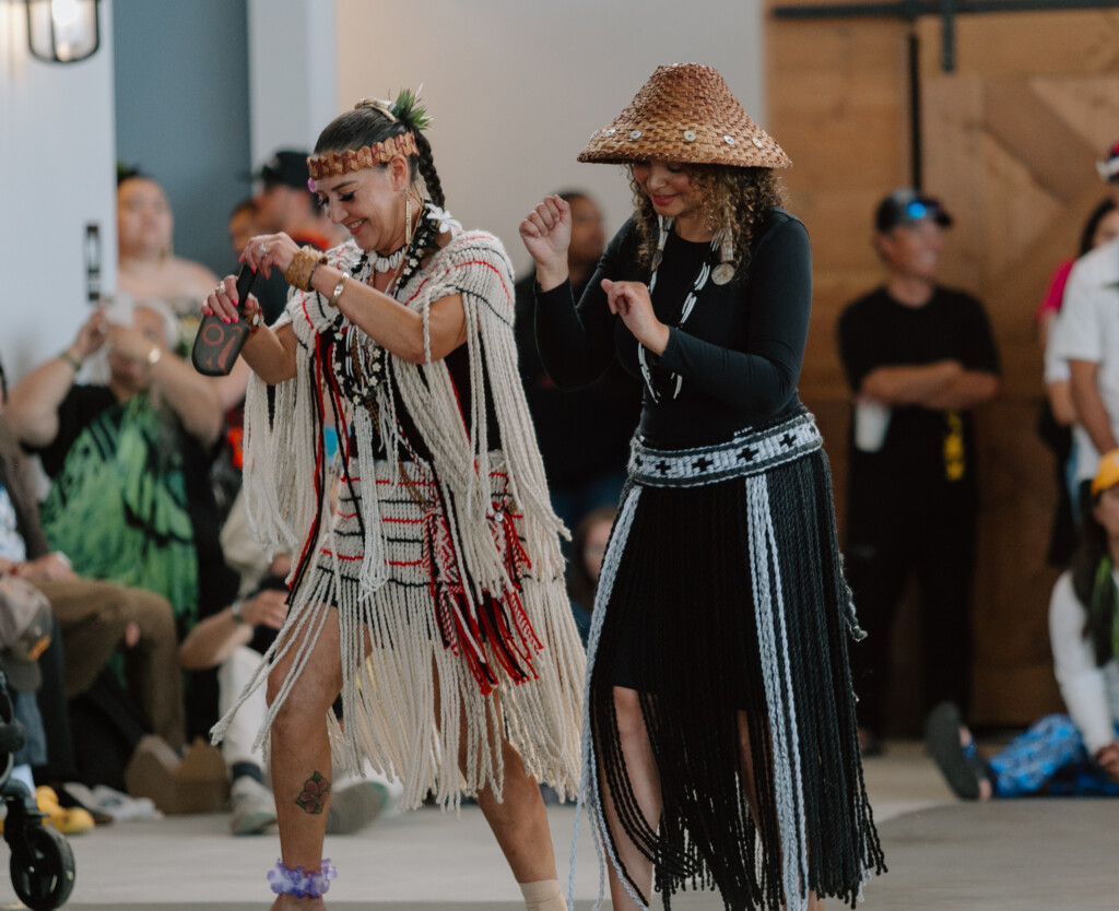 Women from the Puyallup Tribe perform a dance ritual at the welcome event.
