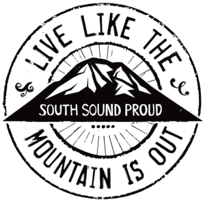 South Sound Proud logo with, "Live Like the Mountain is Out" circling a mountain graphic.