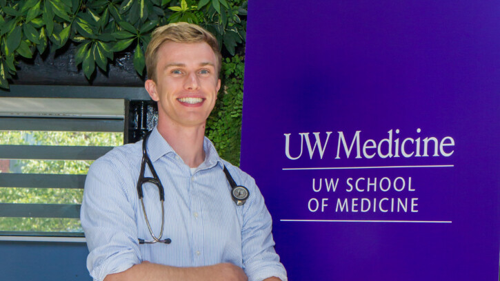 Banken posing in front of the UW School of Medicine Sign. All photos in this article are provided by Banken.