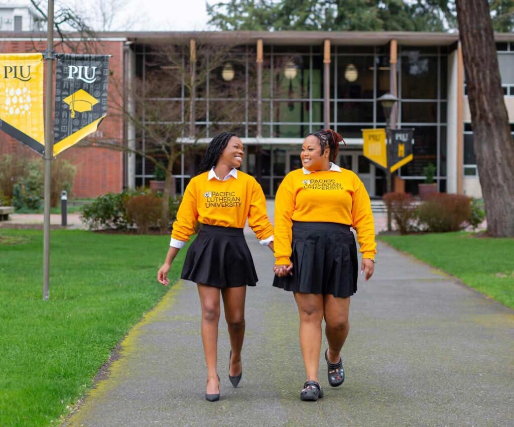 Zoneice Grose in a graduation photo with her best friend from the nursing program at PLU.
