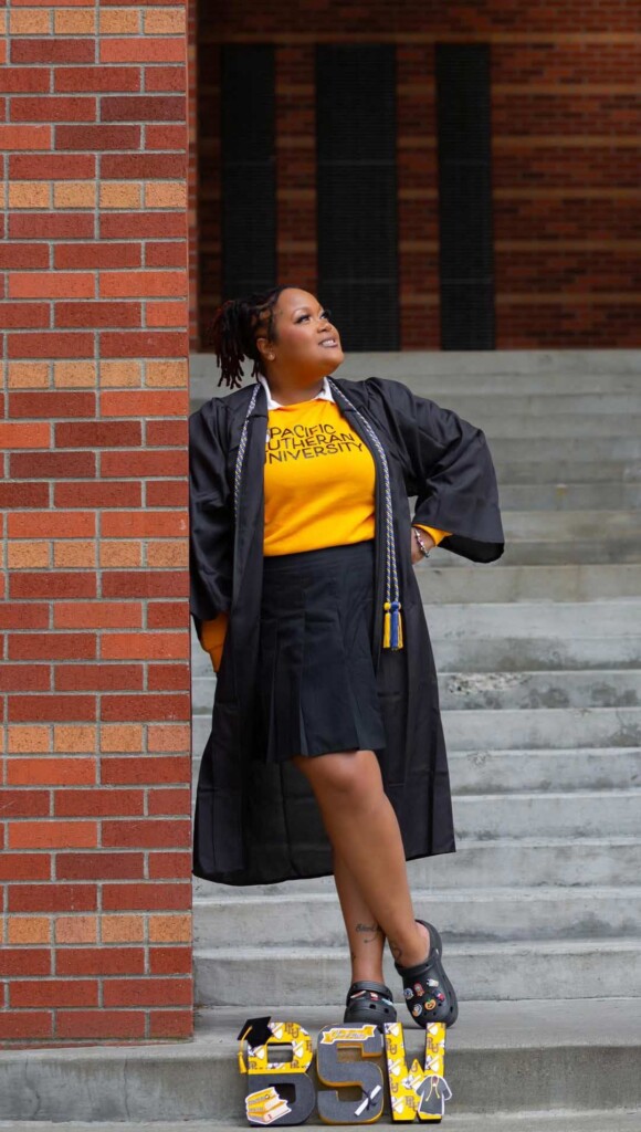Zoneice Grose in a graduation photo at PLU.