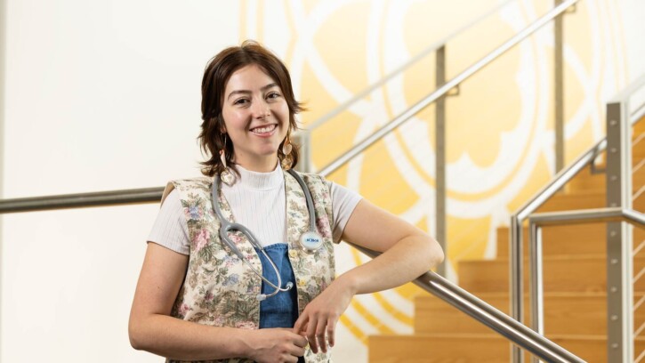 Olivia Tate, graduating with degrees in Nursing, Religion, an individualized major in Native American and Indigenous studies with a minor in Peace Car Prep Certification, poses for their Senior Spotlight portrait, Tuesday, May 20, 2025, in the at PLU School of Nursing Clinical Learning and Simulation Center. (PLU Photo / Sy Bean)