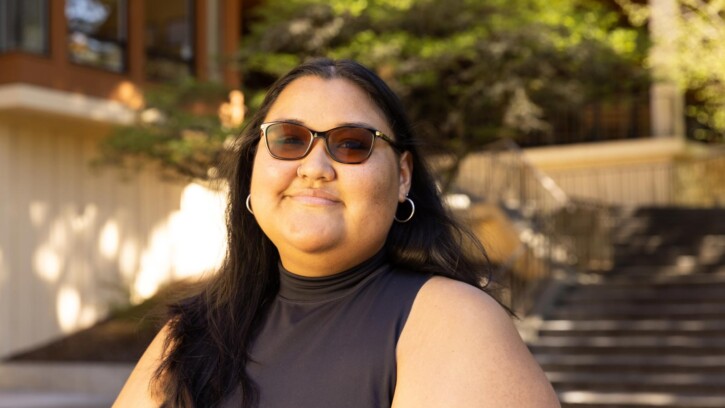 PJ Morales, a double major in psychology and philosophy, works in the food pantry, where she met her mentor Susan Pavur,}, in the AUC at PLU. (PLU Photo / Sy Bean)