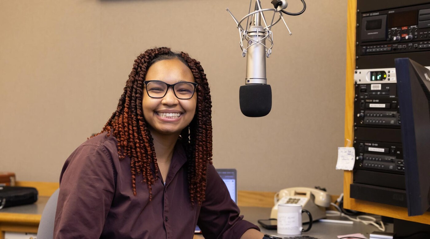 Zari Warden, a double major in Communication and Gender, Sexuality, and Race Studies, works in the student ran Lute Air Student Radio (LASR), Tuesday, April 29, 2025, in the Neeb Building at PLU. (PLU Photo / Sy Bean)