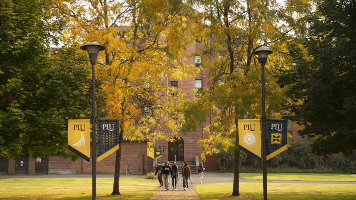 Students walk to class on a fall day at PLU.