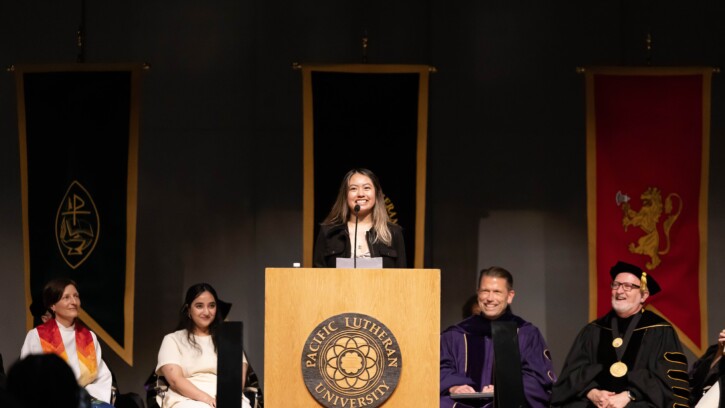 Morales smiles at a podium during her speech for the incoming class of 2029 at Convocation.