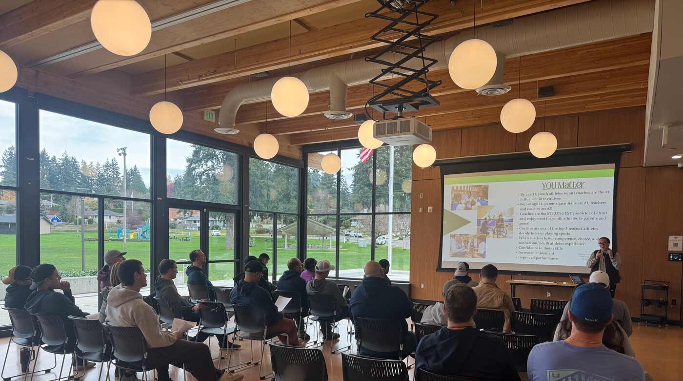 Mallory Mann, department chair and associate professor of kinesiology, giving a presentation.