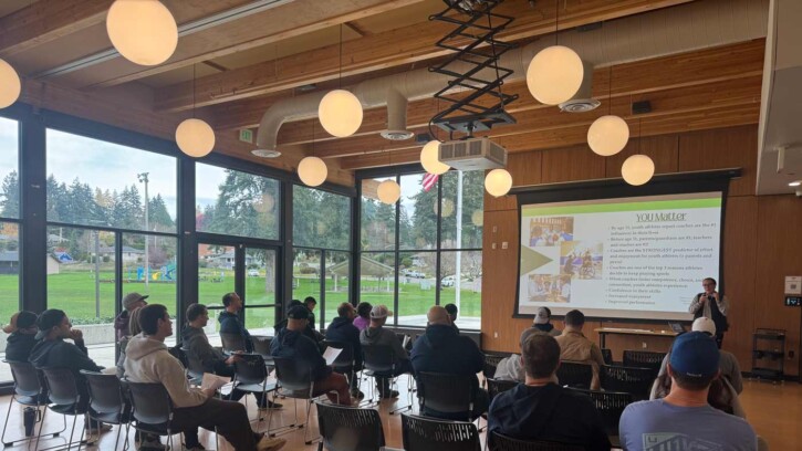 Mallory Mann, department chair and associate professor of kinesiology, giving a presentation.