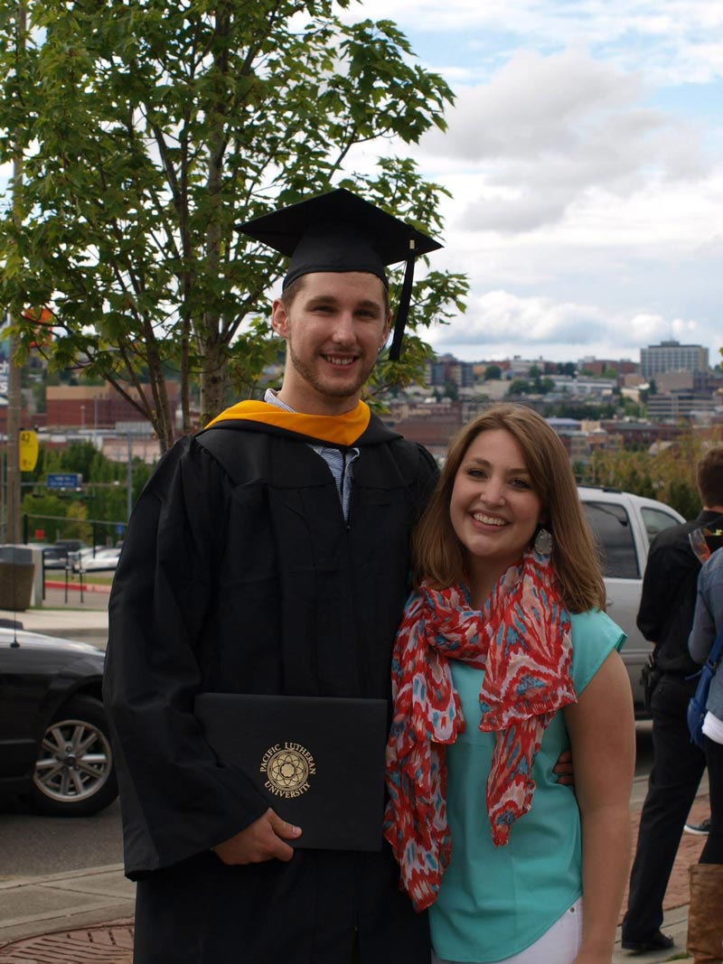 Reister at graduation with his now wife, Claire (also a Lute Class of 2012).