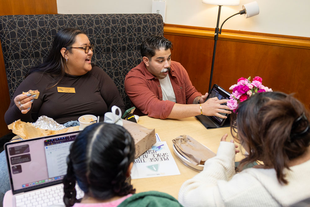 Social Work major Adrian Restrepo has been working on a communications plan for the department of Wellbeing Services and Resources, Thursday, April 9, 2026, at PLU. (PLU Photo / Sy Bean)