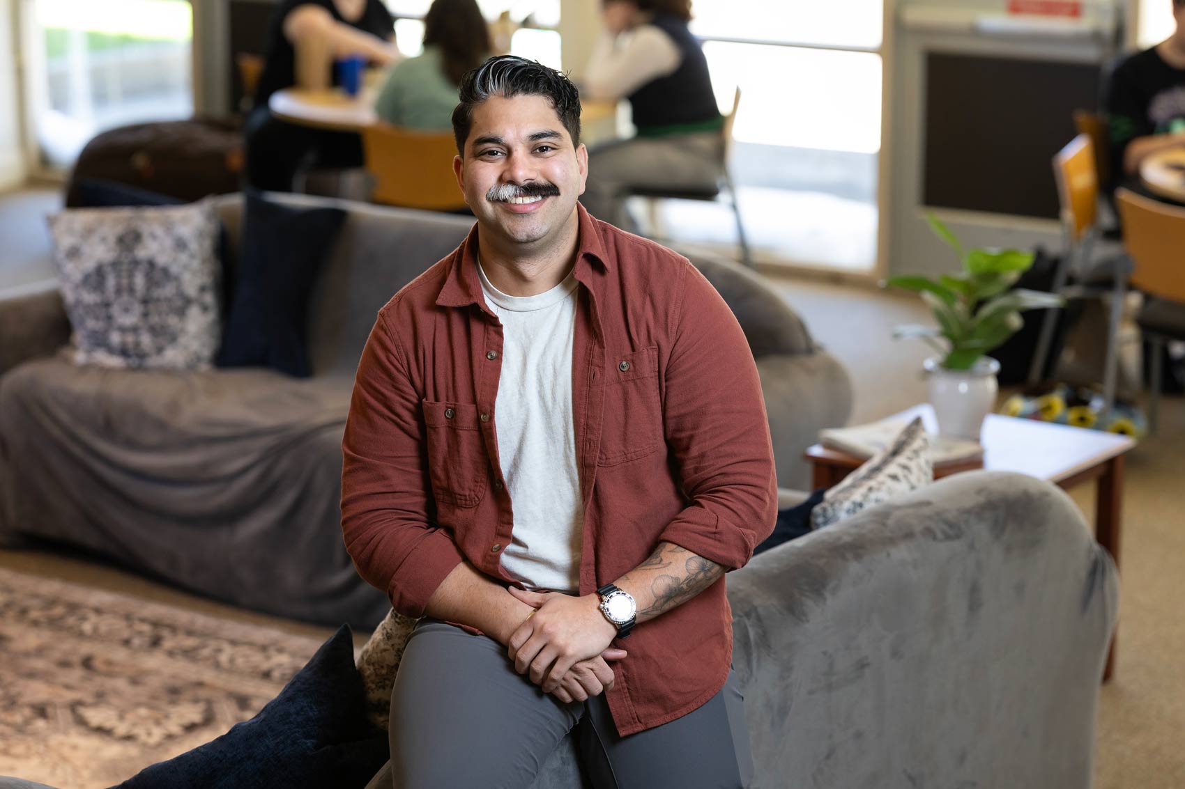 Social Work major Adrian Restrepo has been working on a communications plan for the department of Wellbeing Services and Resources, Thursday, April 9, 2026, at PLU. (PLU Photo / Sy Bean)