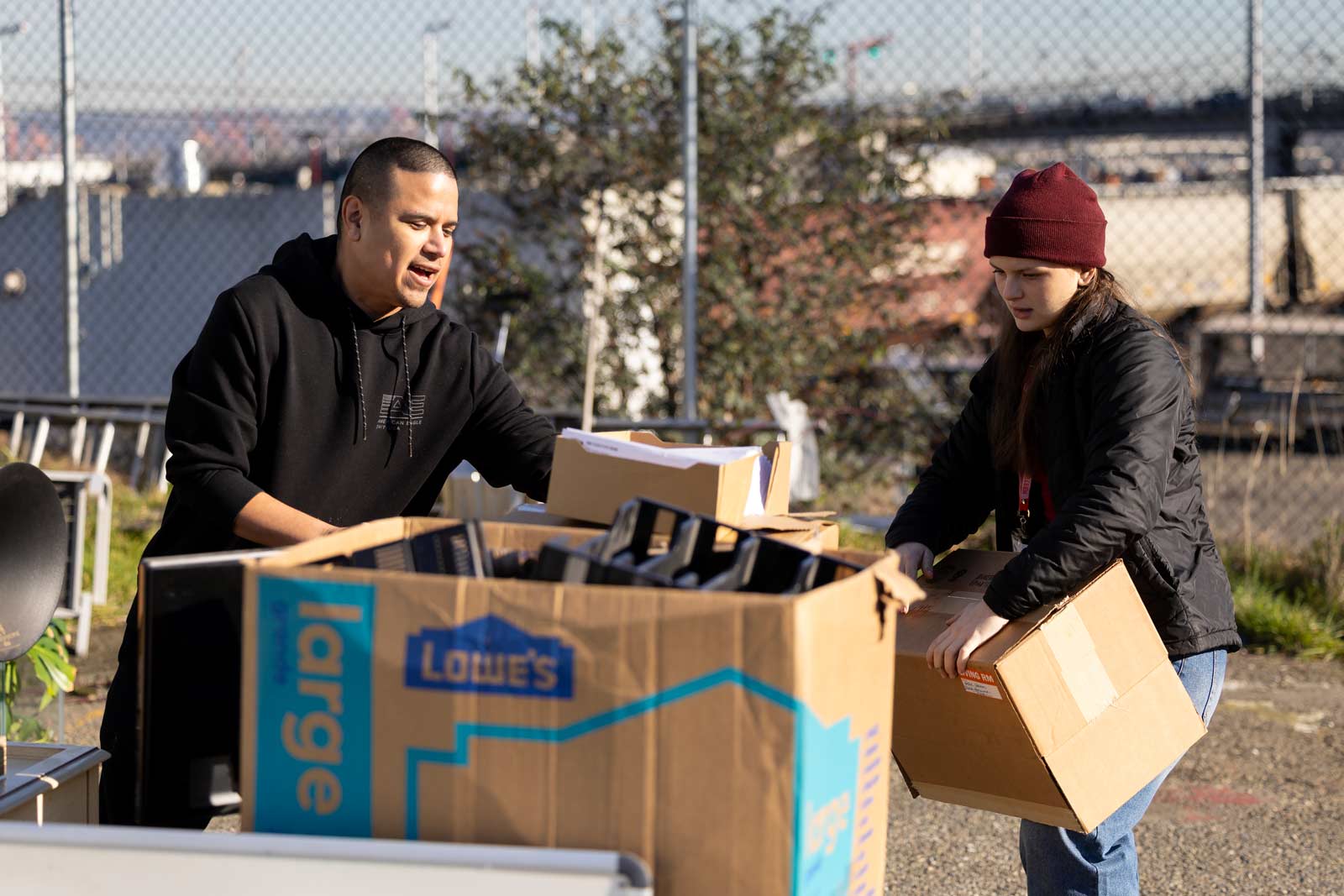 Students in SOCW 175 volunteer at the NW Furniture Bank, Wednesday, Jan. 22, 2025, in Tacoma. The course is an intense experience of service and community work on Tacoma's Hilltop District and Tacoma's eastside where students learn firsthand about poverty and participate in community projects. (PLU Photo / Sy Bean)