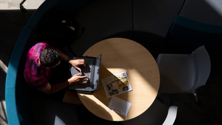 Light shines on students studying in Rieke, Monday, Sept. 26, 2022, at PLU. (PLU Photo / Sy Bean)