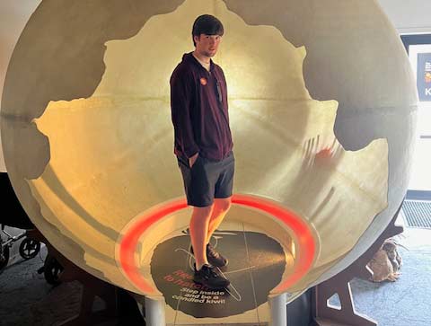 Calvin stands inside an enlarged kiwi egg reconstruction at the National Kiwi Hatchery in Rotorua, New Zealand. Calvin stands inside an enlarged kiwi egg reconstruction at the National Kiwi Hatchery in Rotorua, New Zealand.