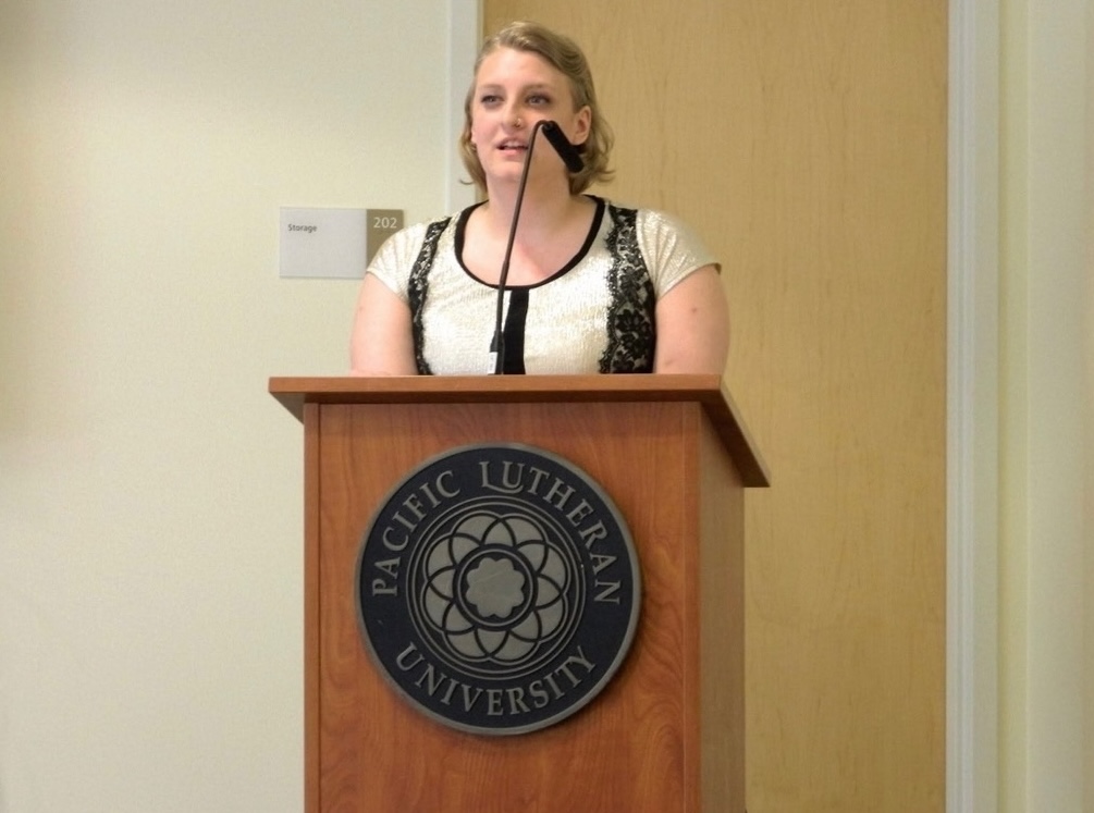Gould speaks at a podium