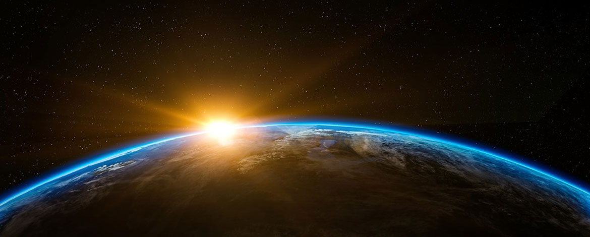 sun rising over earth