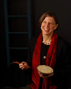 Pam Ronald holding rice bowl