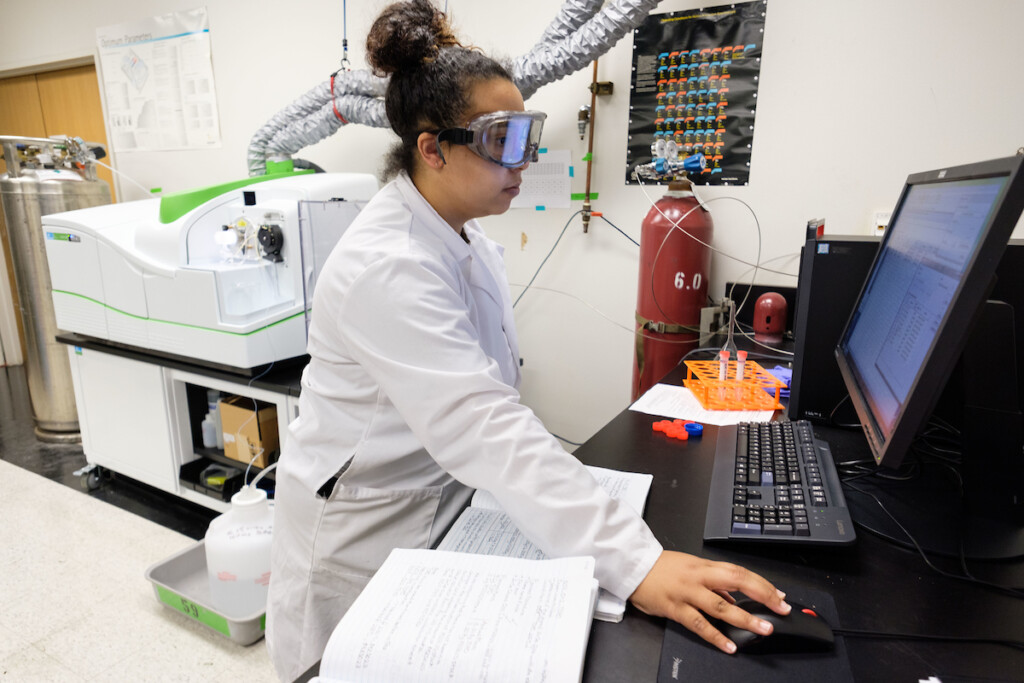 Jenise Cavness works in the lab as part of a Student faculty summer research in chemistry with Prof. Andrea Munro at PLU,.