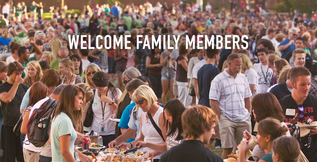 Welcome Family Members - students and parents on Foss field eating