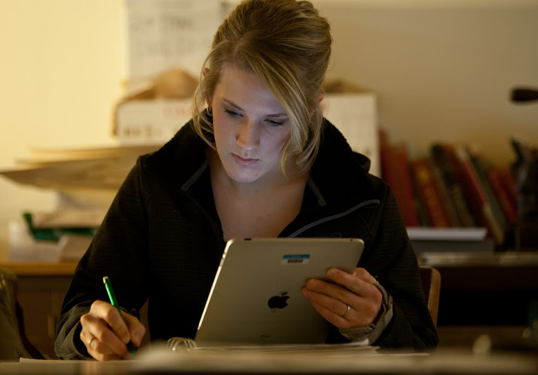 Female student working on iPad