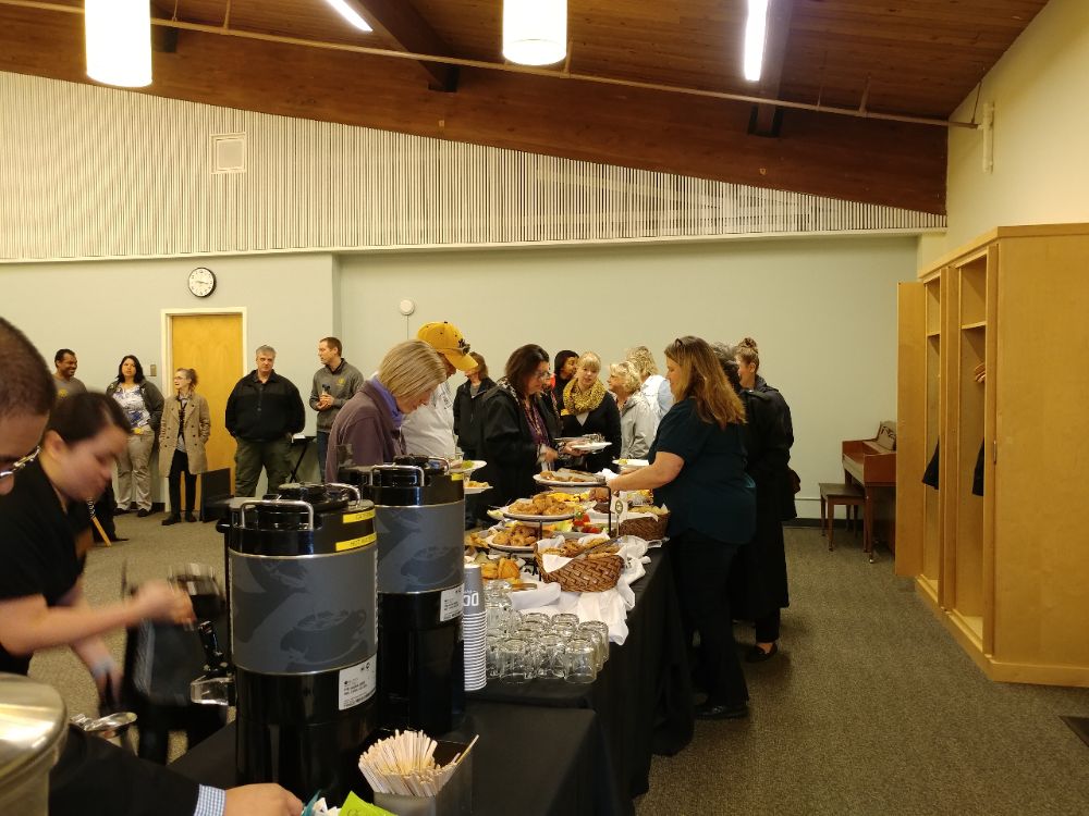 Staff selecting and eating food