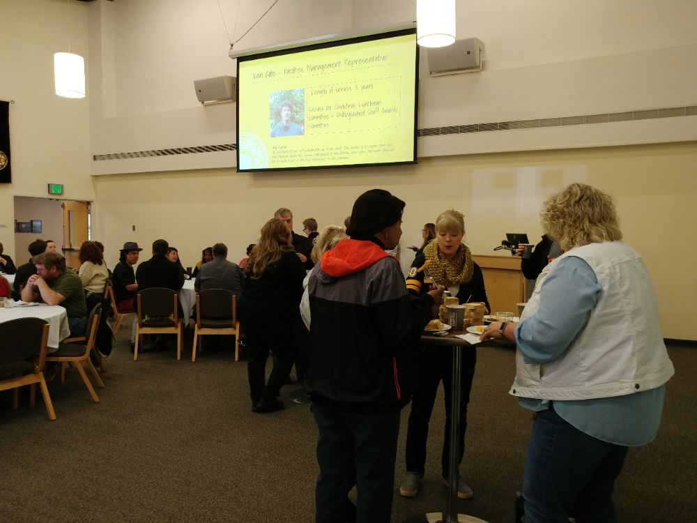 Staff selecting and eating food