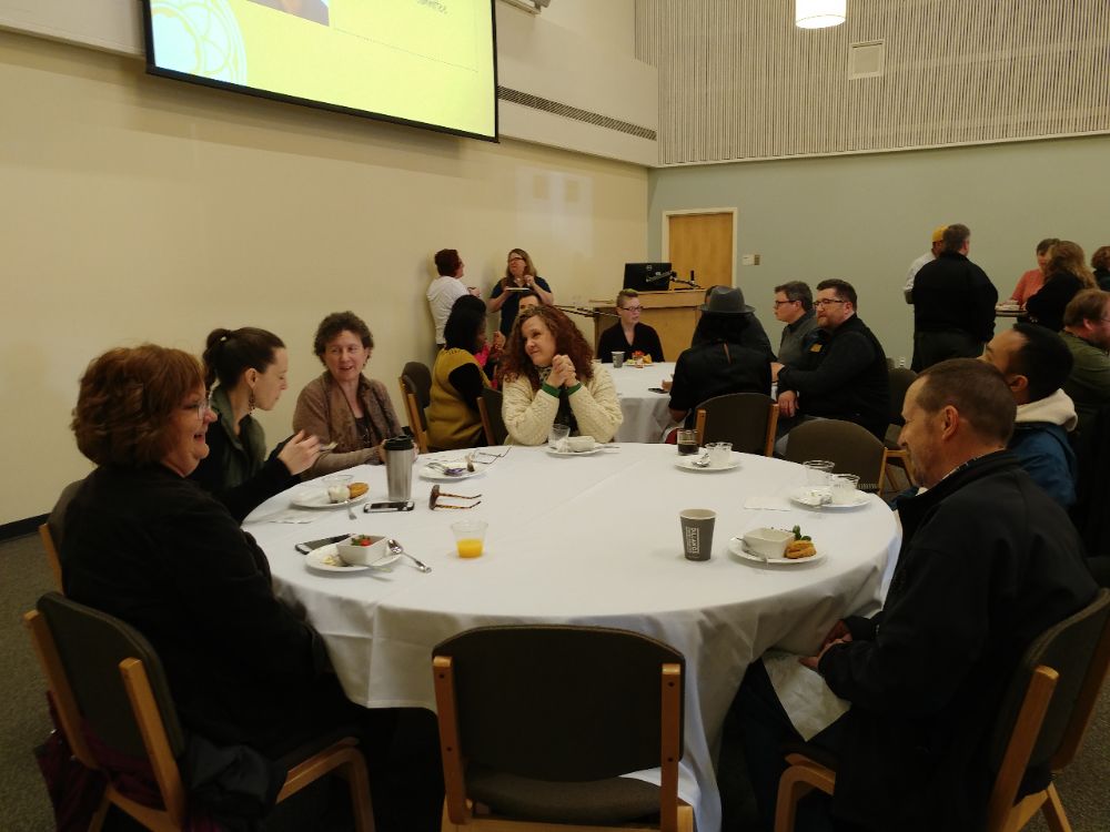 Staff selecting and eating food