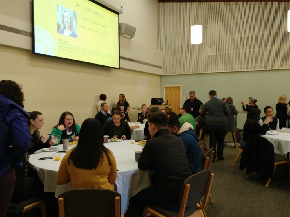 Staff selecting and eating food