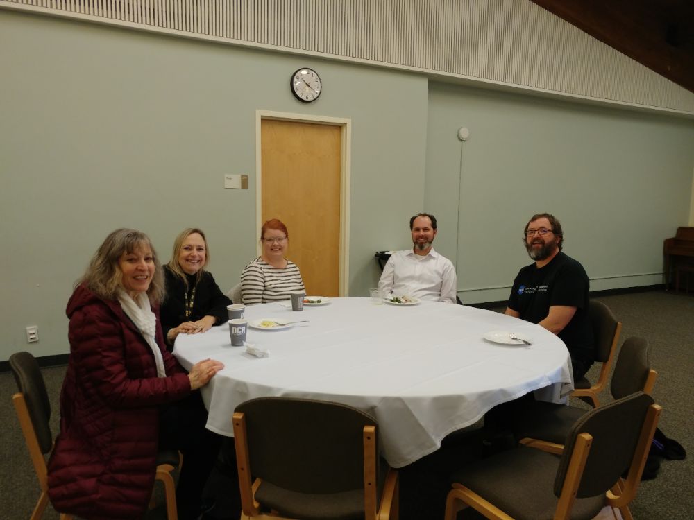 Staff selecting and eating food