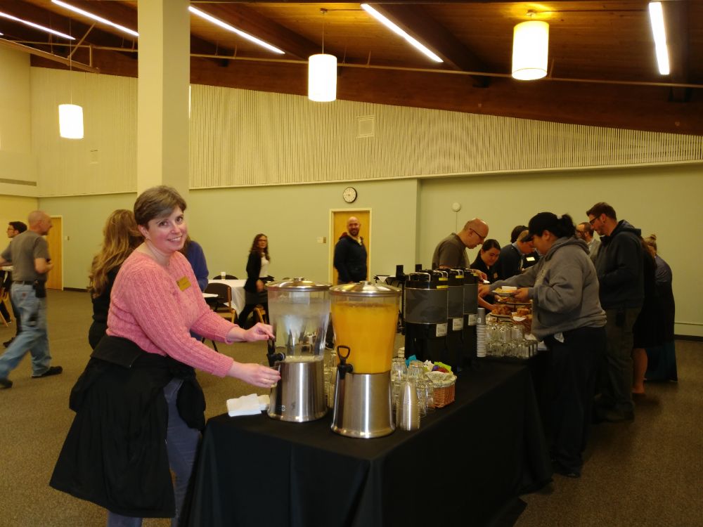 Staff selecting and eating food